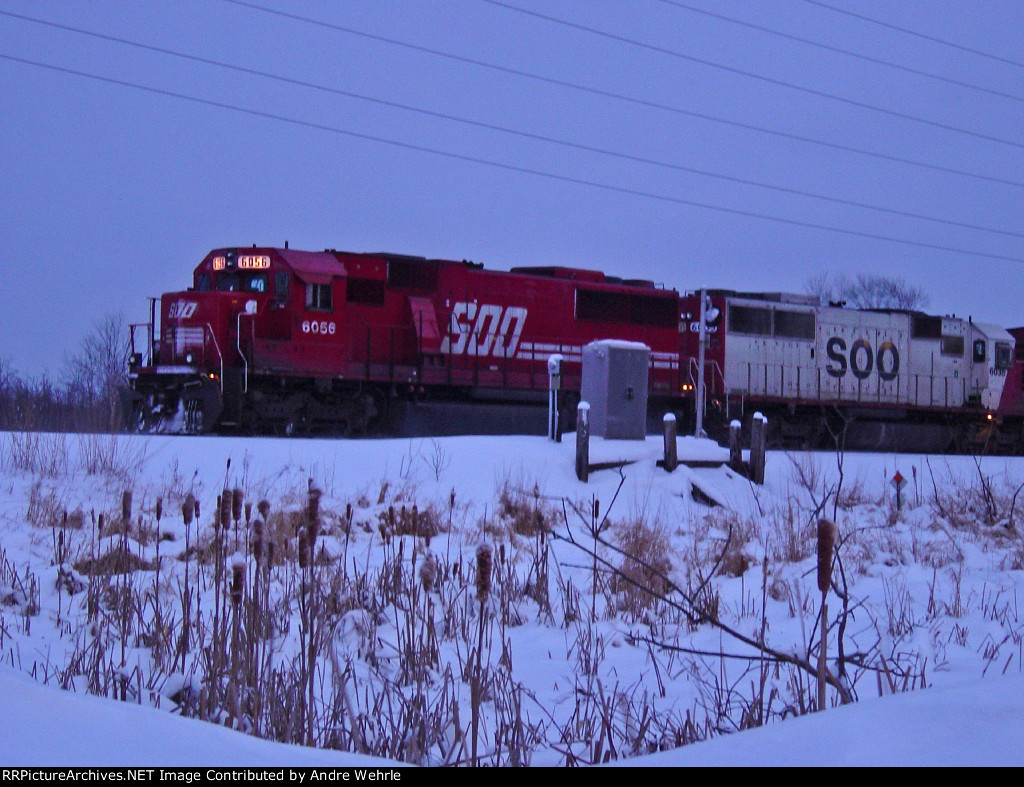SOO 6056 & 6035 pause for a crew change at sunset